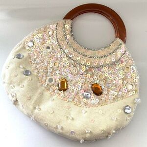 Bijoux Turner cream sequin crescent handbag with round handle